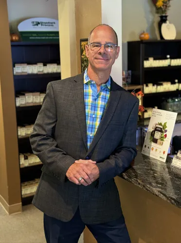 Chiropractor Waukesha WI Barry Radandt And Christine At Front Desk